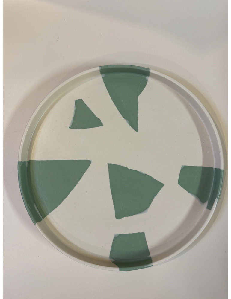 Le plateau fait à la main avec des designs uniques