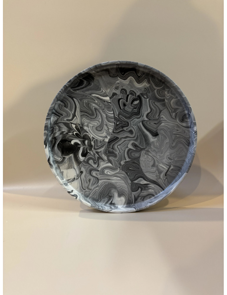 Le plateau fait à la main avec des designs uniques